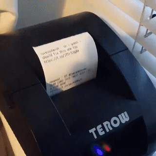 Ticket tape in action, a receipt printer printing out textual tweets